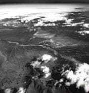 Clouds and land seen from a plane window